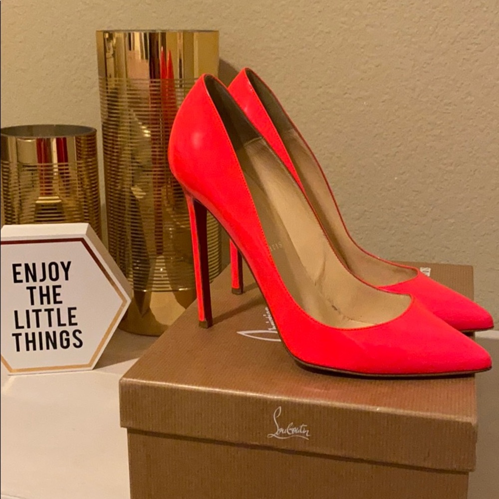 Christian Louboutin neon pink pumps
